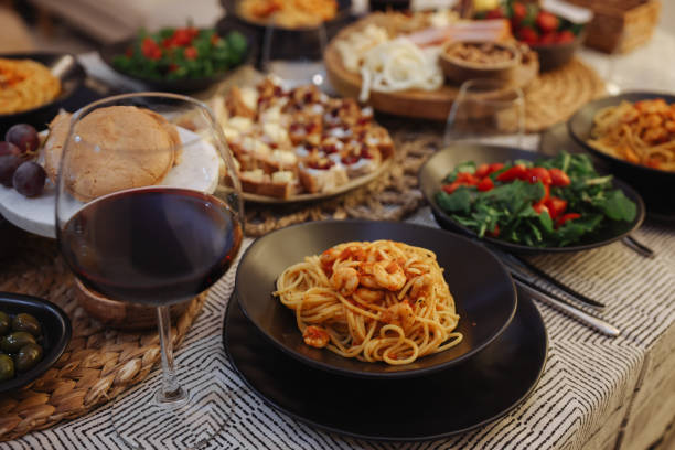 istock Family dinner for a celebration with red wine 1458860928