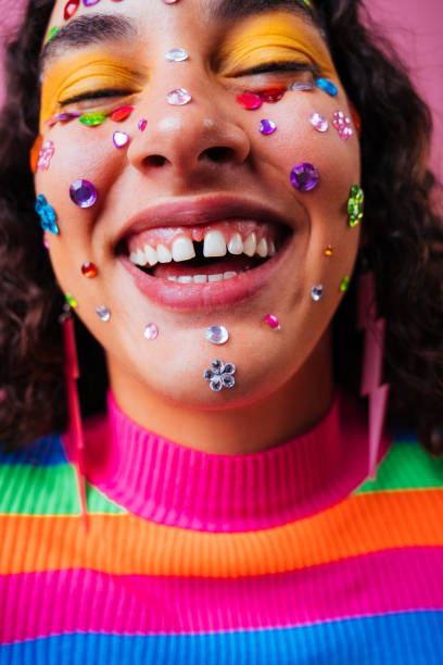 Creative studio portrait of beautiful hispanic woman with diastema