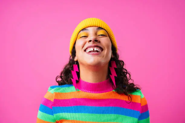 Beautiful young hispanic woman with diastema with colorful and cool style - Confident and interesting female with diverse and unique style, concepts about fashion, individuality and body acceptance