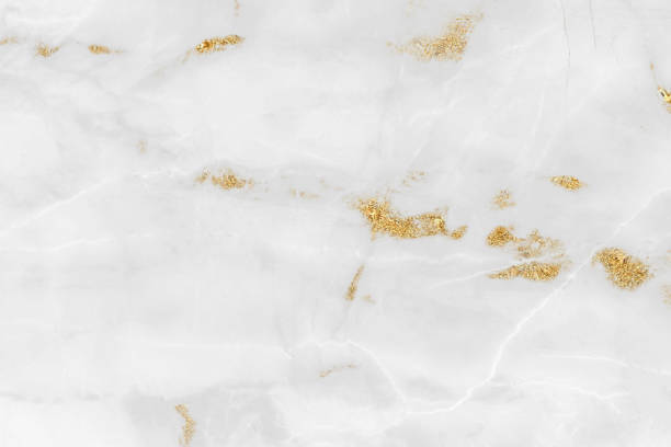 istock White and gold marble luxury wall texture with shine golden line pattern abstract background design for a cover book or wallpaper and banner website 1458862906