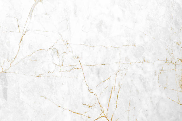istock White and gold marble luxury wall texture with shine golden line pattern abstract background design for a cover book or wallpaper and banner website 1458862913