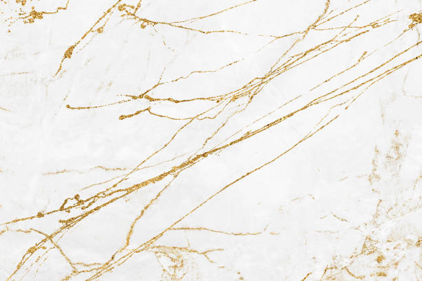 istock White and gold marble luxury wall texture with shine golden line pattern abstract background design for a cover book or wallpaper and banner website 1458862927