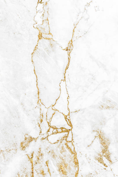 istock White and gold marble luxury wall texture with shine golden line pattern abstract background design for a cover book or wallpaper and banner website 1458862935