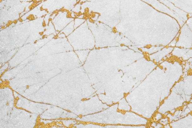 istock White and gold marble luxury wall texture with shine golden line pattern abstract background design for a cover book or wallpaper and banner website 1458862965