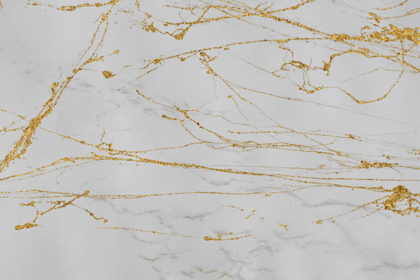 istock White and gold marble luxury wall texture with shine golden line pattern abstract background design for a cover book or wallpaper and banner website 1458862974