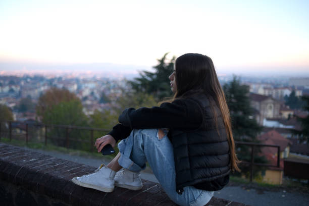 istock girl contemplating the landscape 1458863067
