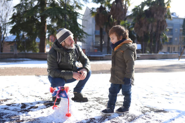 father and son playing