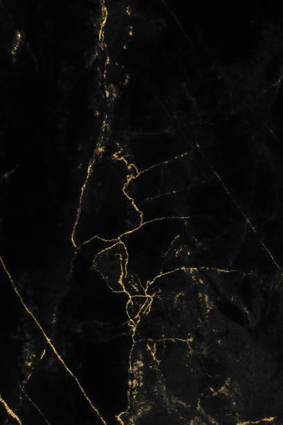 istock Black and gold marble luxury wall texture with shiny golden line pattern abstract background design for a cover book or wallpaper and banner website 1458863909