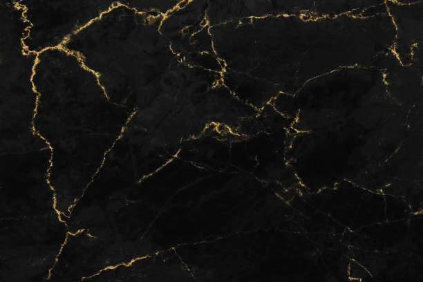 istock Black and gold marble luxury wall texture with shiny golden line pattern abstract background design for a cover book or wallpaper and banner website 1458863922
