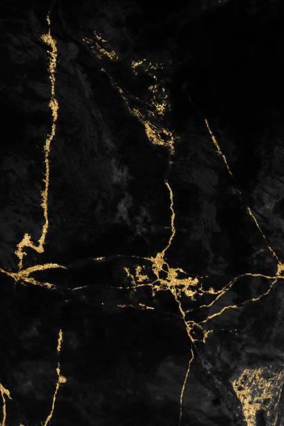 istock Black and gold marble luxury wall texture with shiny golden line pattern abstract background design for a cover book or wallpaper and banner website 1458864440