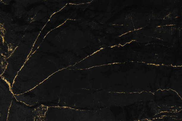 istock Black and gold marble luxury wall texture with shiny golden line pattern abstract background design for a cover book or wallpaper and banner website 1458864446