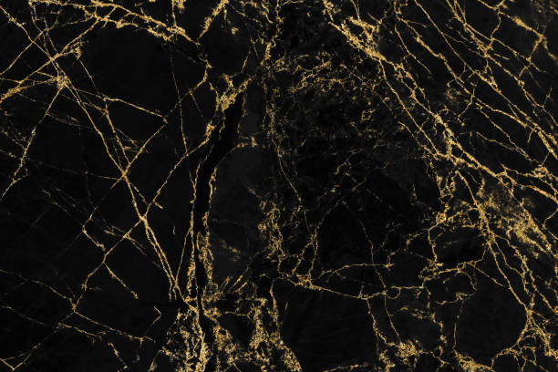 istock Black and gold marble luxury wall texture with shiny golden line pattern abstract background design for a cover book or wallpaper and banner website 1458864476