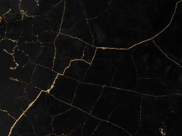 istock Black and gold marble luxury wall texture with shiny golden line pattern abstract background design for a cover book or wallpaper and banner website 1458864577