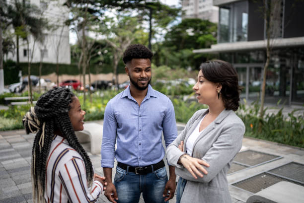 istock Coworkers talking in the street 1458866541