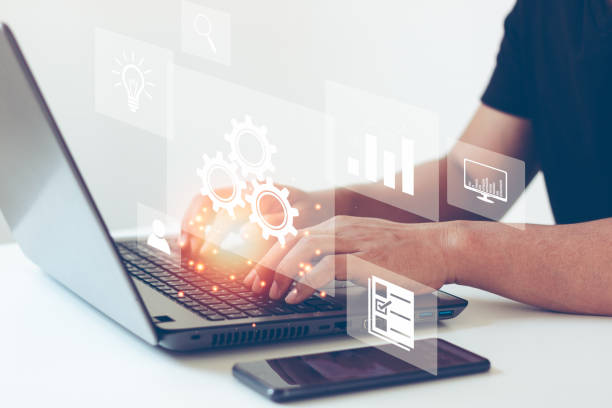 istock Automation concept. Optimise business process workflow. business people typing on laptop computer keyboard with virtual interface icons. Digital transformation technology strategy. 1458873335