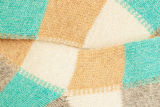 istock Handmade wool knitted fabric, colorful wool background texture. Warm accessories, clothing 1458877399