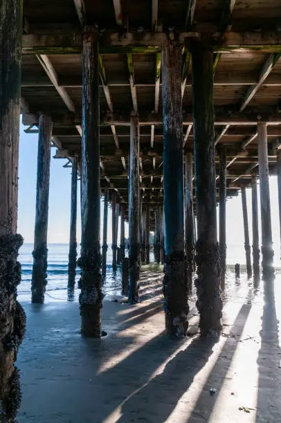 Exterior shot of the wooden support structure that carries the Sea Cliff Pier near Aptos, California.