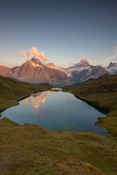 istock a mountain lake during a sunset 1458882047