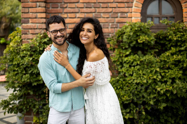 istock Beautiful romantic couple embracing 1458882994