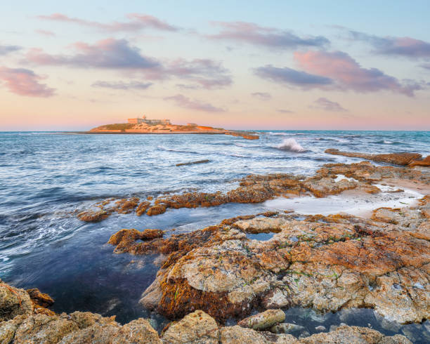 istock Dramatic evening scene of awesome spring seascape on the Passero cape Sicily. 1458892086