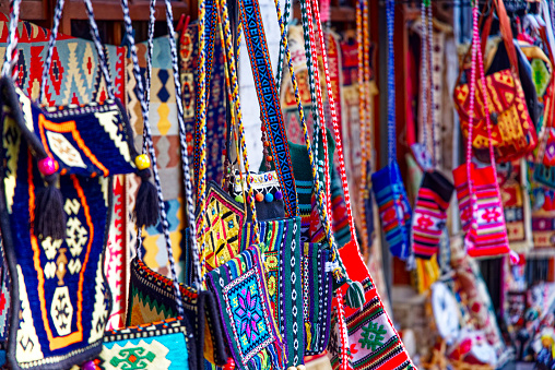 View of colorful indigenous maya fabric with different patterns on market in Chichicastenango, Guatemala