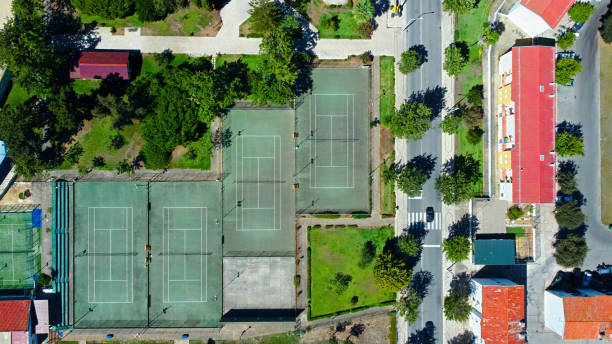 istock Assimetric Tennis Courts 1458895368