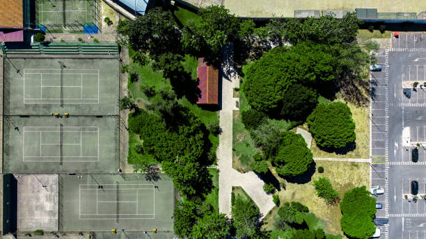 istock Drone Aerial Tennis Courts Assimetry 1458895373