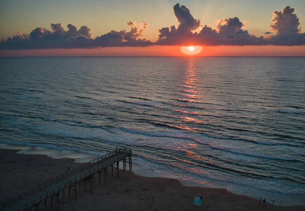 Drone aerial shots of sunrise over South Padre Island beach