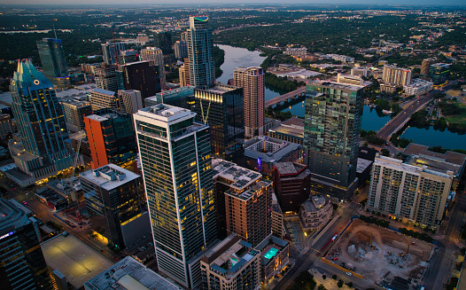 Buildings and towers in Austin Texas under construction at sunset and sunrise June 2022