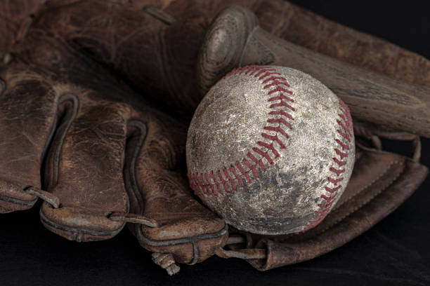 istock Vintage Baseball Glove, Ball and Bat 1458900652