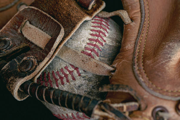 istock Vintage Baseball Catcher's Mitt with Baseball 1458900666
