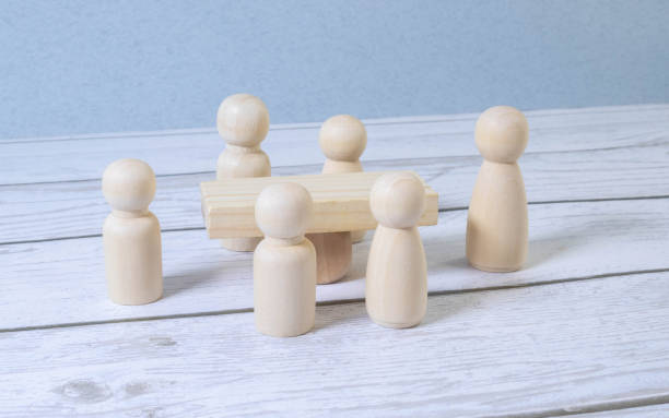 istock Group Of Multi-Ethnic People Working On Digital Devices Around Table 1458900817