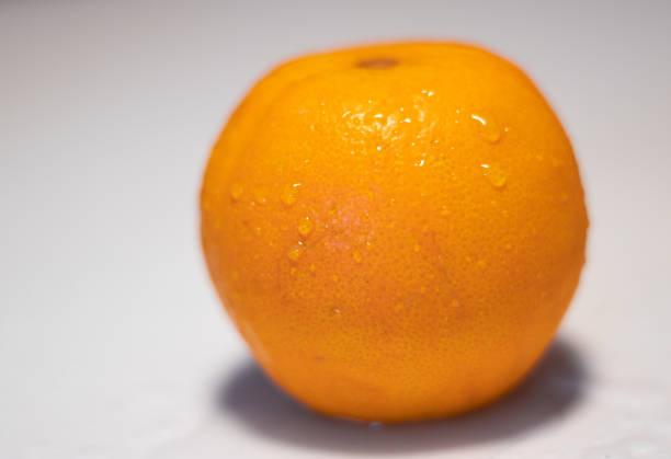 istock fresh orange on a white background_03 1458900982
