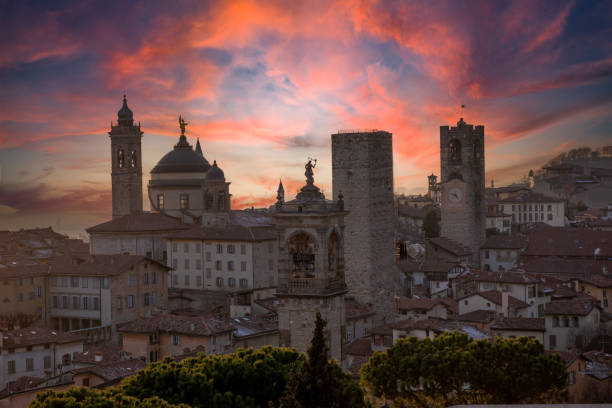 Bergamo Alta skyline at sunset Skyline of Bergamo Old capital of culture 2023 brescia stock pictures, royalty-free photos & images