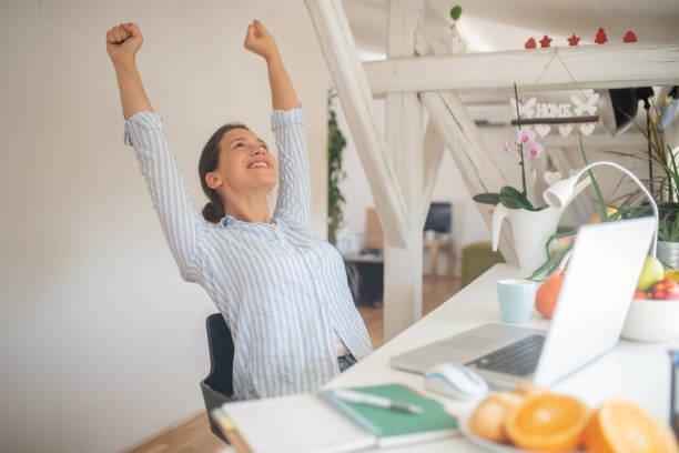 istock Young woman working from home 1458914100