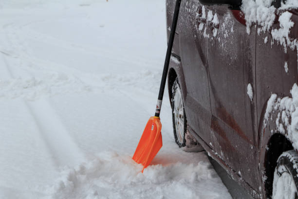 istock driving a car on a snowy road in winter 1458914593