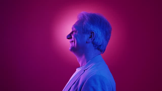 neon light aged man profile portrait stylish look
