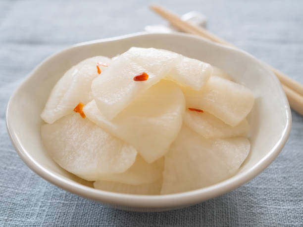 Pickled Daikon Radish Pickled Daikon Radish dikon radish stock pictures, royalty-free photos & images