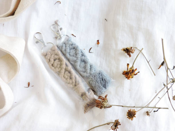 istock Macrame keychain isolated on white background with dried flowers. 1458931864
