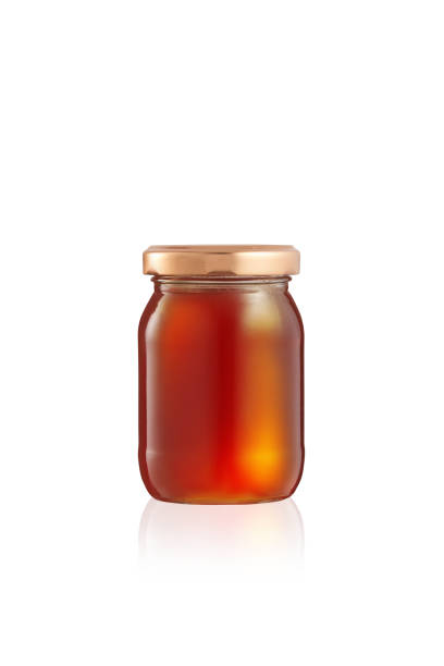 Pure Golden Honey Bottle Over White
