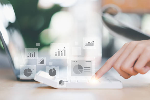 istock business people calculate online business statistics chart reports to analyze and improve corporate strategy ,Manage financial and marketing documents, Company growth information,data management 1458947148