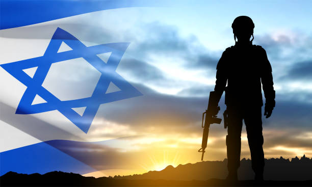 istock Silhouette of soldiers with Israel flag 1458947192