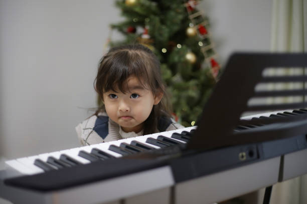 istock A girl who hates piano practice 1458949649