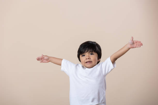istock Happy Mexican little boy arms wide open 1458963397