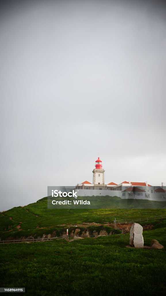 The Cabo da Roca Lighthouse Standing at the most westerly point on mainland Europe, Cabo da Roca provides an unrivalled panoramic view out over the immensity of the Atlantic Ocean. Architecture Stock Photo