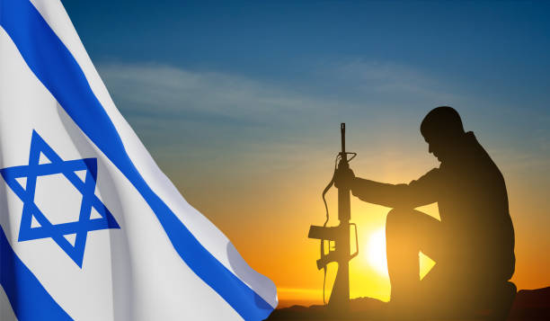 istock Silhouette of soldier with Israel flag 1458973321