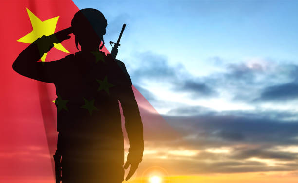 istock Silhouette of Saluting Soldier with China flag 1458973486