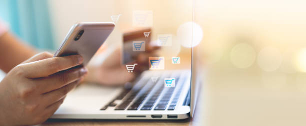 istock Woman using credit card to pay online 1458976589
