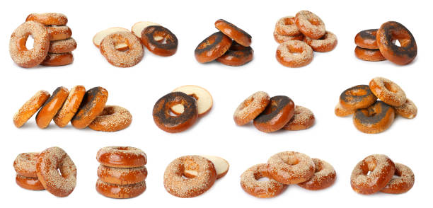 istock Set with tasty fresh bagels on white background. Banner design 1458984429