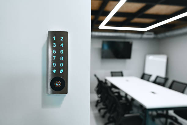 istock Electronic digital door lock on white office wall 1458984785